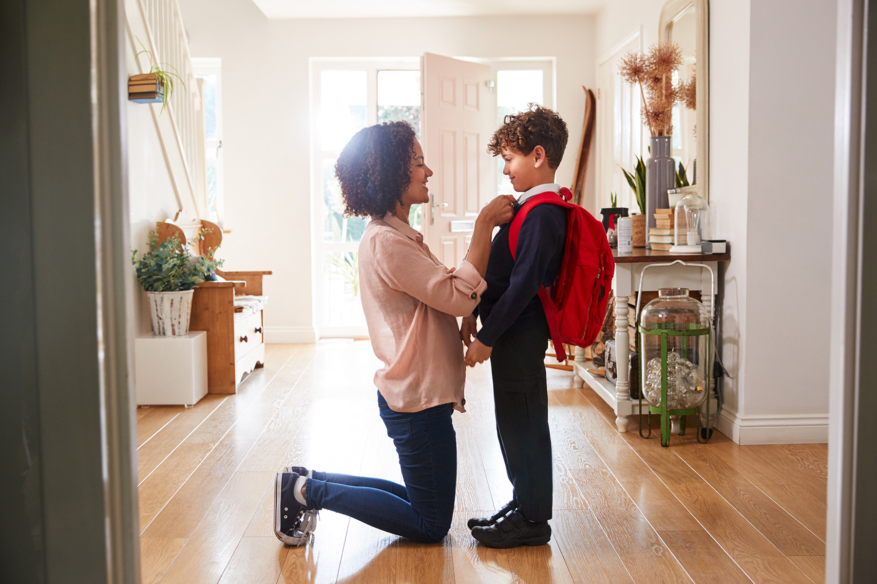 Mom sending her son off to school