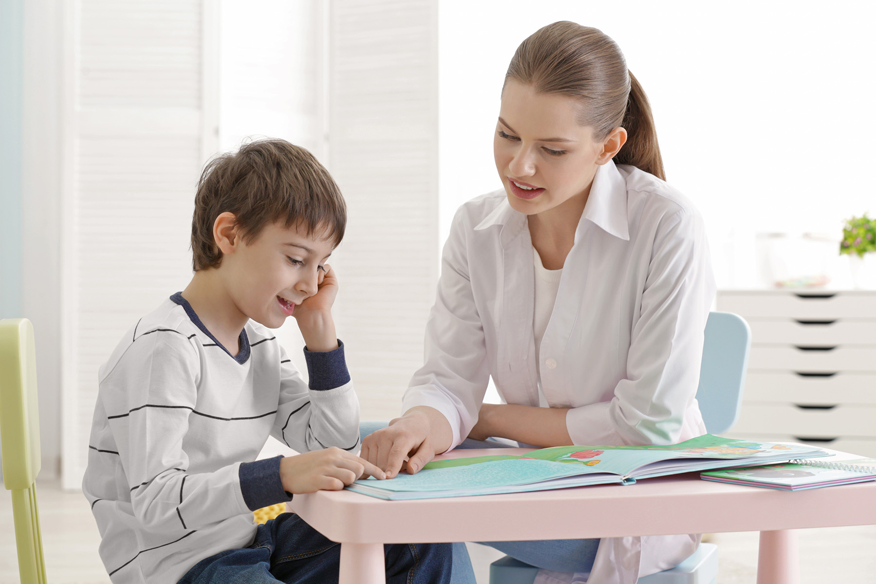 Little boy working with a Speech Pathologist